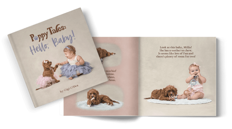 Image of a children's book titled Puppy Tales: Hello, Baby! featuring a photography of a puppy and a baby, both wearing tutus sitting and holding hands on the cover. The book is laying on top of an open spread from the book showing a baby and the puppy chewing on a teether.