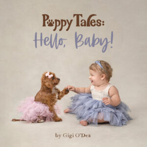 Children's picture book titled Puppy Tales: Hello, Baby! by Gigi O'Dea depicting a puppy and baby girl wearing tutus and holding hands